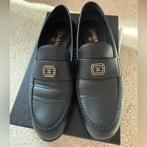 Chanel black leather logo loafers